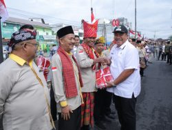 Pemerintah Kabupaten Asahan Bagikan Bendera Merah Putih