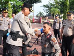 Kapolres Nias Pimpin Tradisi Penyambutan Bintara Polri Lulusan Diktuk 2025